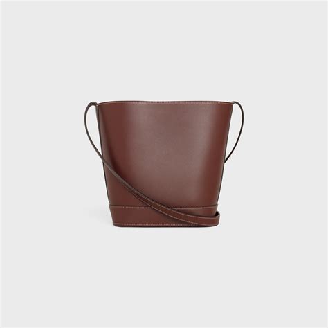 SMALL BUCKET CUIR TRIOMPHE IN SMOOTH CALFSKIN